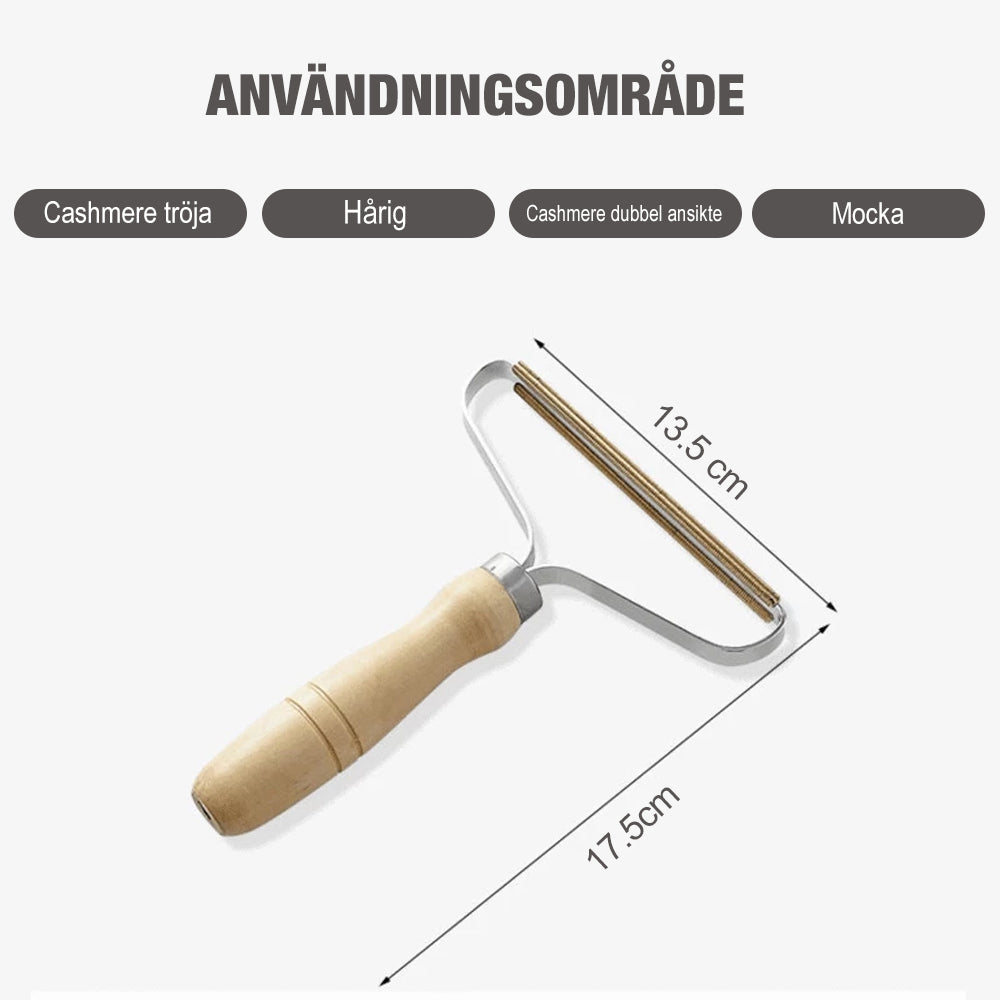 Bärbar luddborttagare för kläder och tyger, elegant och kompakt, avlägsnar ludd effektivt och batterifritt.
