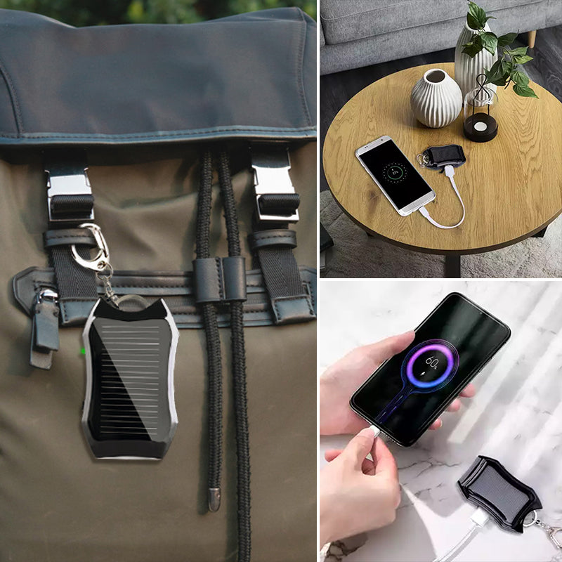 Bärbar mini powerbank på nyckelring, svart och vit, kompakt design, perfekt för resor och enkel att bära med sig.