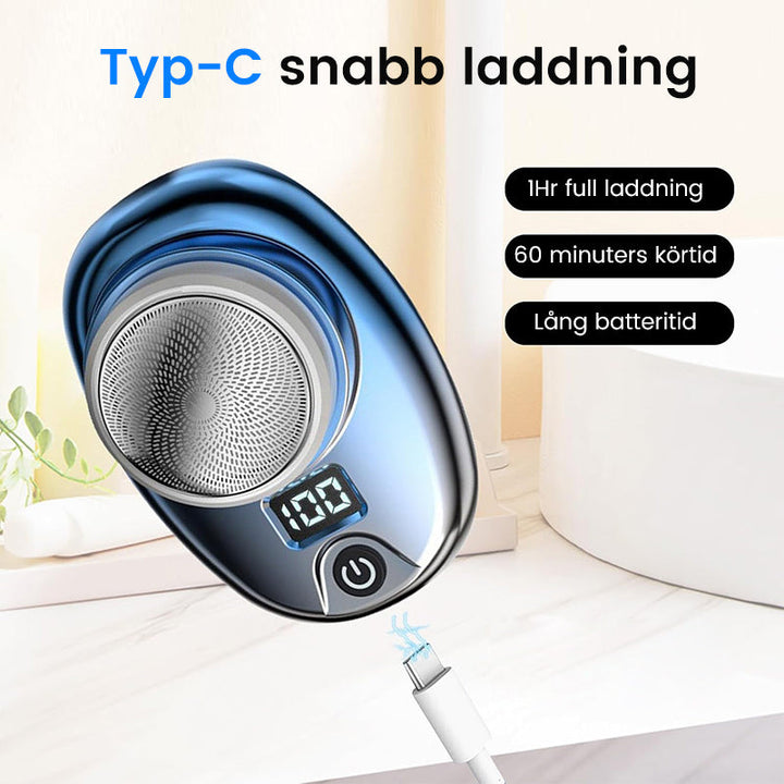 "Bärbar Mini Rakapparat för Män i blå/silver, kompakt design med rostfria blad och kraftfull motor, lämplig för resor."