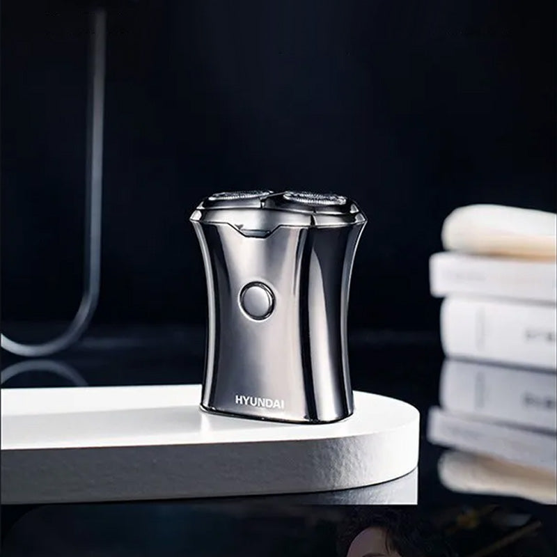 "Bärbar mini rakapparat för män, sladdlös och kompakt, elegant design, passar för både våt och torr rakning."