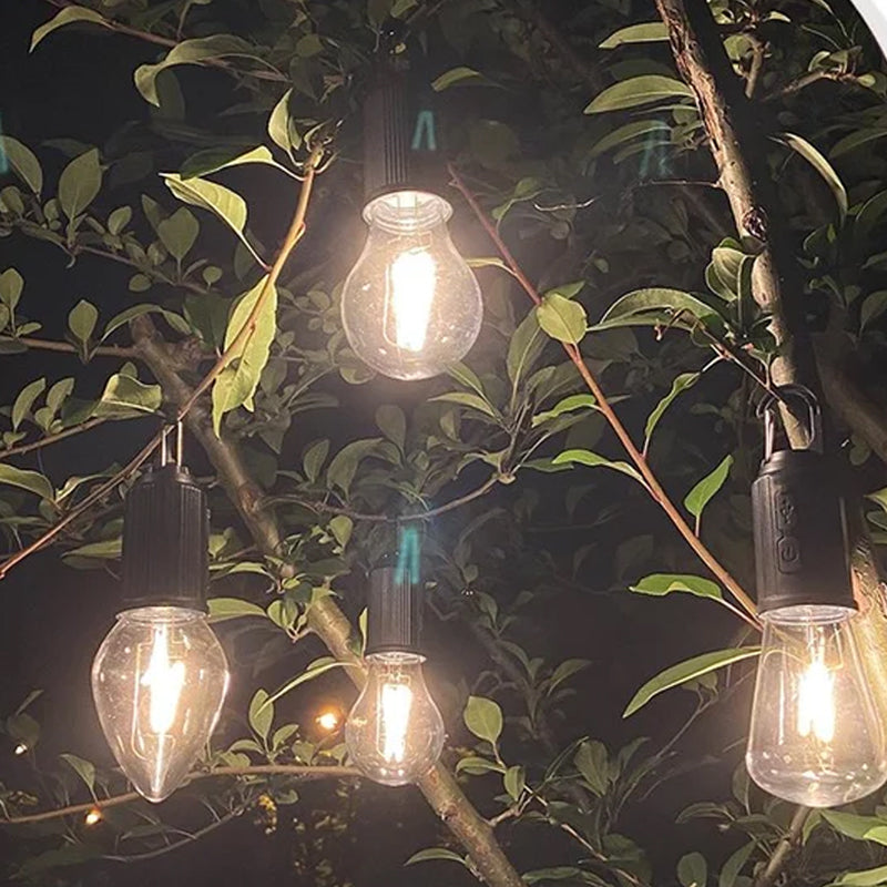 "Bärbar retro hängande lampa med vintage design och Type-C laddning, perfekt för utomhusbruk som camping och trädgård."