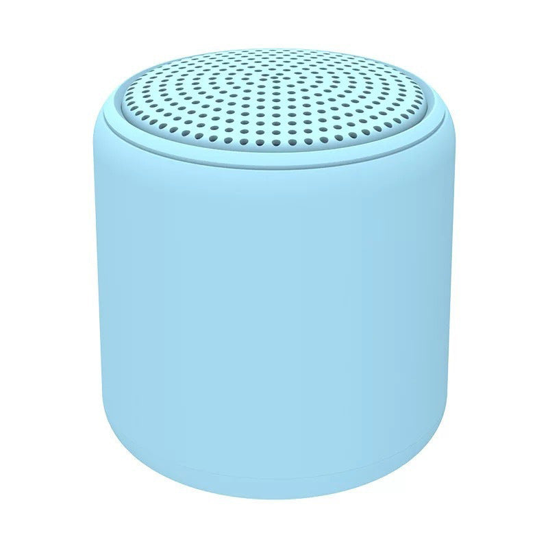 "Bärbar trådlös Bluetooth-högtalare i macaroon-färg med modern design, kompakt och lätt, perfekt för resor och hemmet."
