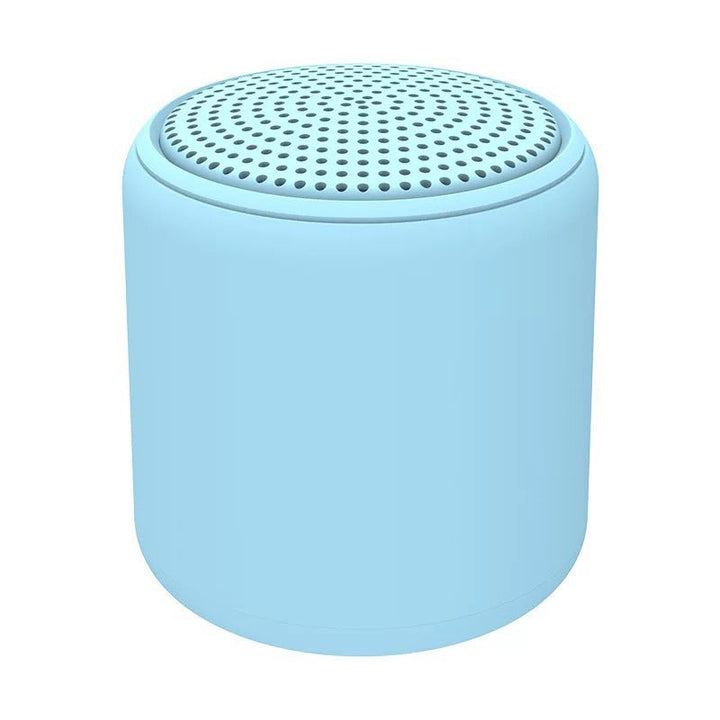 "Bärbar trådlös Bluetooth-högtalare i macaroon-färg med modern design, kompakt och lätt, perfekt för resor och hemmet."