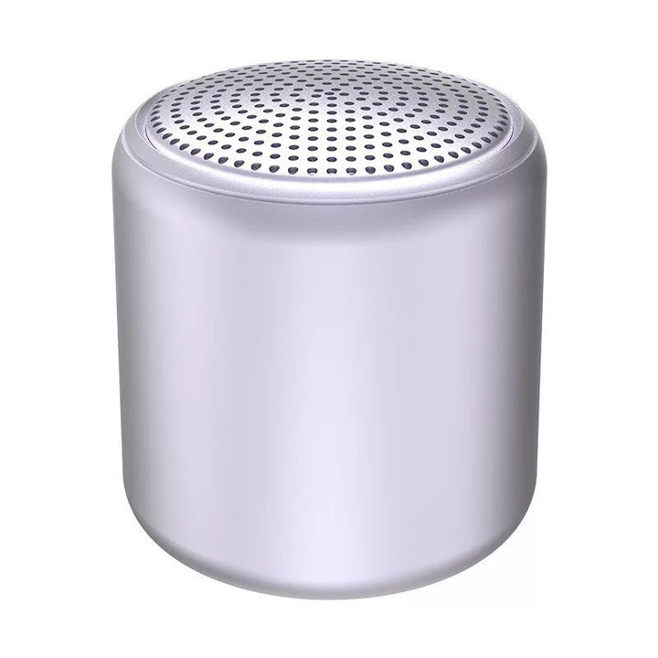 "Bärbar trådlös Bluetooth-högtalare i macaroon-färg med modern design, kompakt och lätt, perfekt för resor och hemmet."