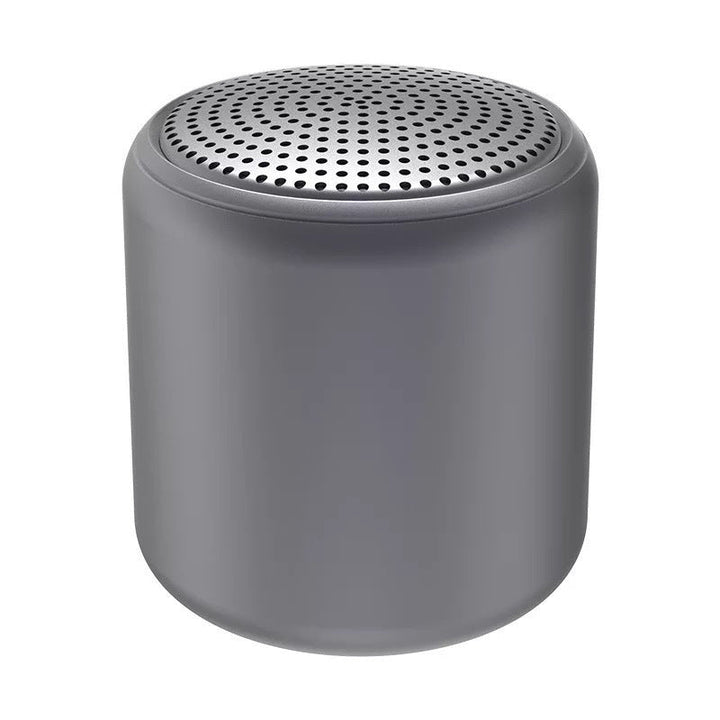 "Bärbar trådlös Bluetooth-högtalare i macaroon-färg med modern design, kompakt och lätt, perfekt för resor och hemmet."