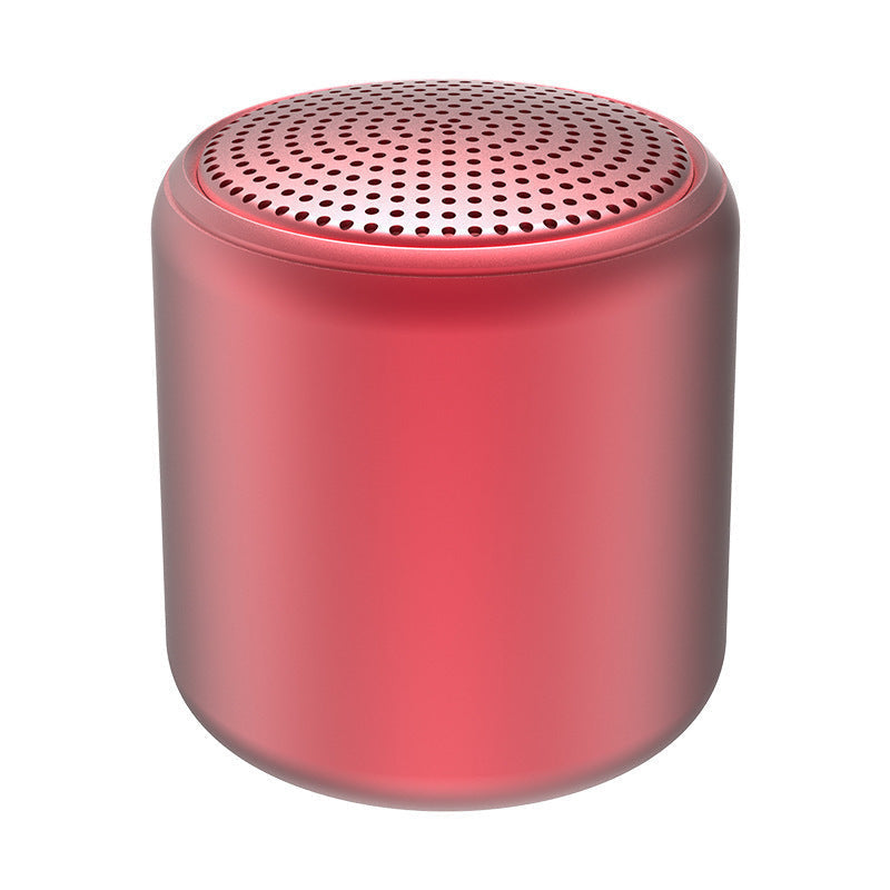 "Bärbar trådlös Bluetooth-högtalare i macaroon-färg med modern design, kompakt och lätt, perfekt för resor och hemmet."