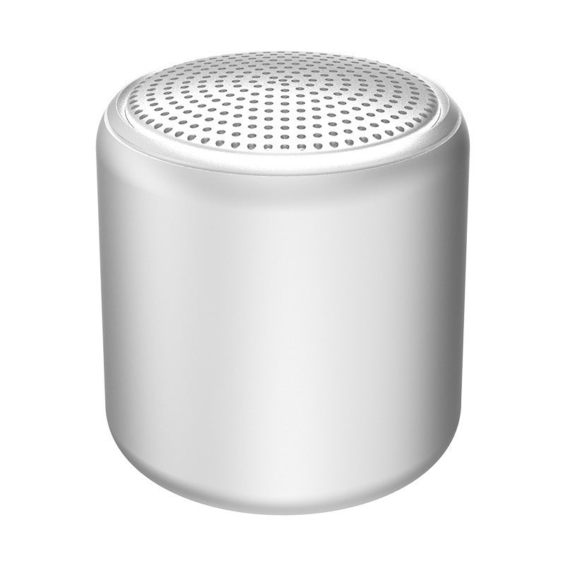"Bärbar trådlös Bluetooth-högtalare i macaroon-färg med modern design, kompakt och lätt, perfekt för resor och hemmet."