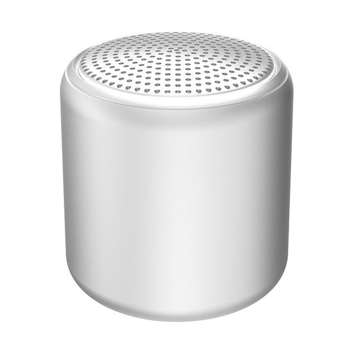 "Bärbar trådlös Bluetooth-högtalare i macaroon-färg med modern design, kompakt och lätt, perfekt för resor och hemmet."