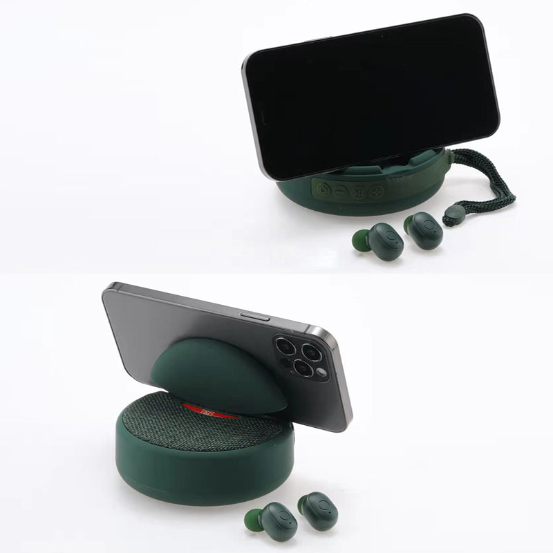 Bärbar TWS Bluetooth-högtalare med hörlurar, kompakt design, svart, levererar rumsfyllande 3D-stereoljud.