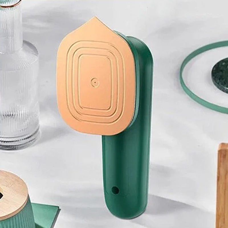 "Bärbart mini ångstrykjärn med kompakt design, kraftfull ånga, röd färg, perfekt för resor och olika tyger."