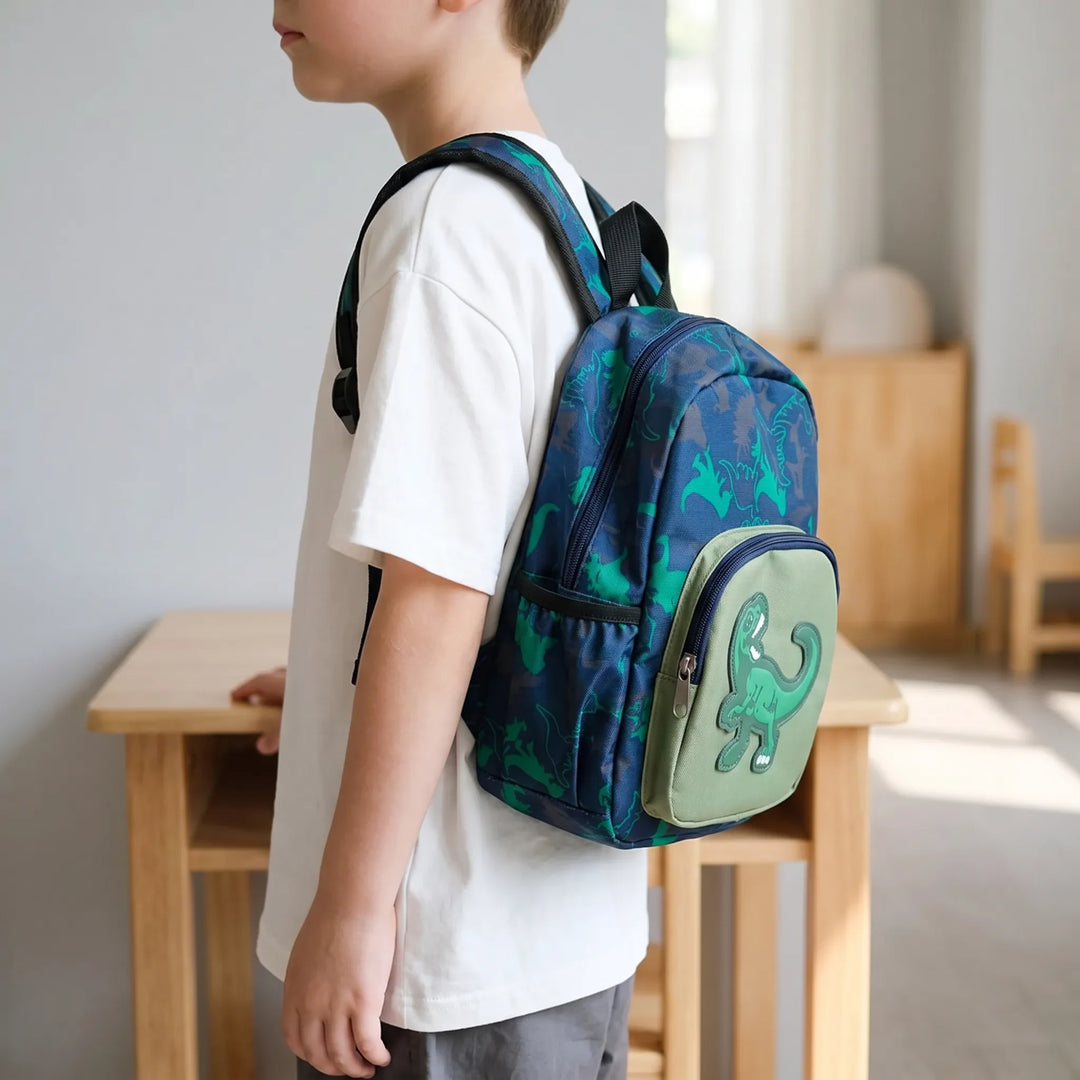 Skolryggsäck med dinosauriemönster, designad för barn och förskolebruk.