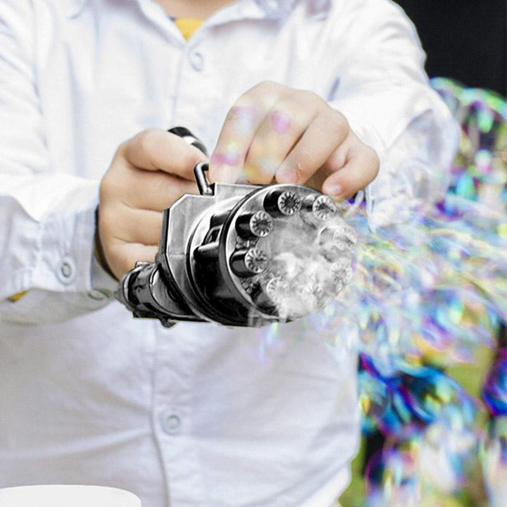 "Batteridriven såpbubbelpistol för barn med färgglada bubblor och ergonomiskt handtag i grön, rosa, gul och svart"