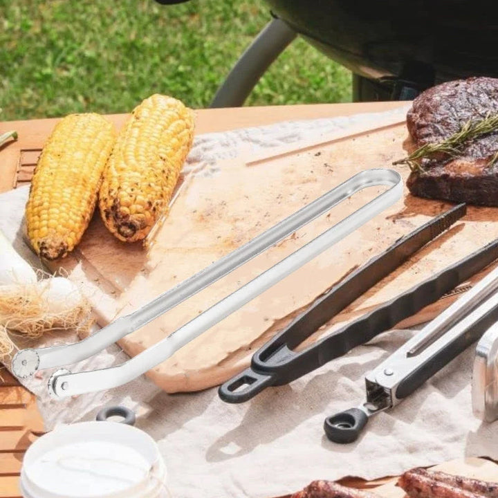 "BBQ-tänger i rostfritt stål med ergonomisk design och justerbar rörelse, perfekta för säker och effektiv grillning."