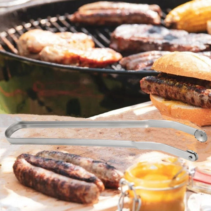 "BBQ-tänger i rostfritt stål med ergonomisk design och justerbar rörelse, perfekta för säker och effektiv grillning."
