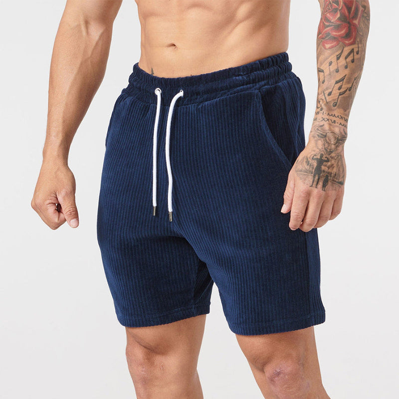"Beige corduroy herrshorts med dragsko, avslappnad passform; mjuk bomullsmanchester perfekt för sommarutflykter."