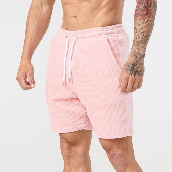 "Beige corduroy herrshorts med dragsko, avslappnad passform; mjuk bomullsmanchester perfekt för sommarutflykter."