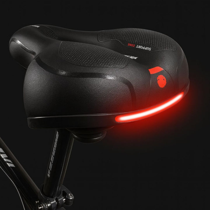 Bekväm cykelsadel med fjädring för optimal komfort, passar både herr och dam.
