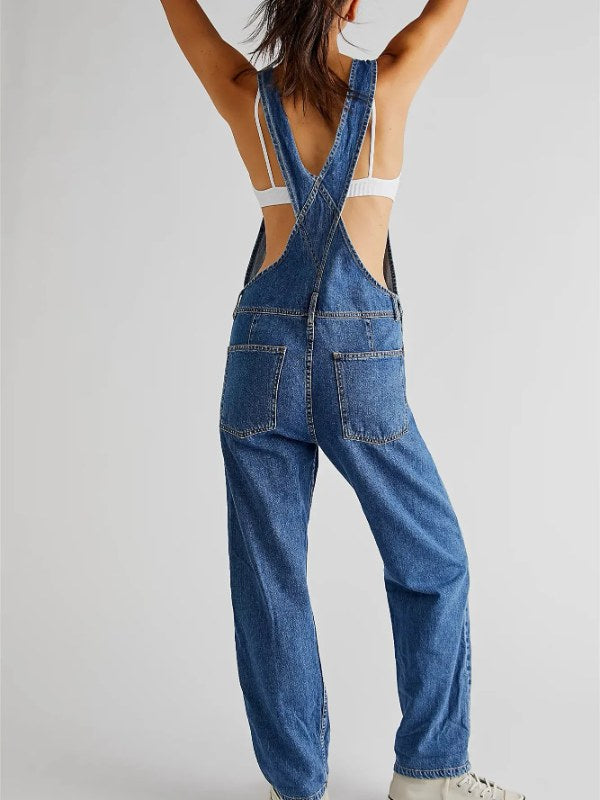 Lång damoverall med justerbara axelband, löst sittande för maximal komfort och stil.