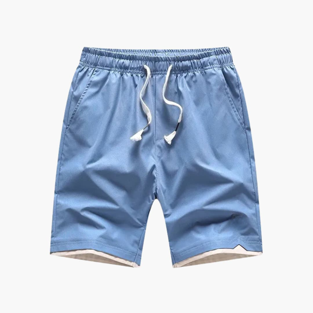 Lätta herrshorts med avslappnad passform, elastisk midja, dragsko och praktiska sidofickor för sommaren.