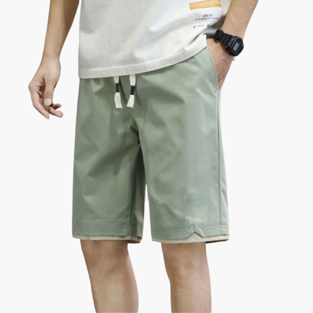 Klassiska sommarshorts för herr med elastisk midja och dragsko, perfekta för en avslappnad och bekväm stil.