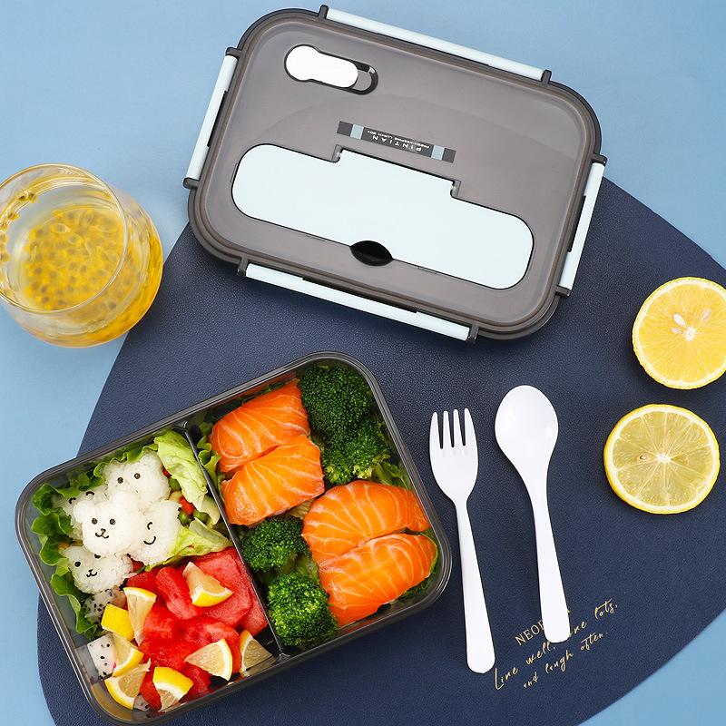 "Bento-låda i plast med flera fack, stilren design i blå, rosa, beige. Perfekt för lunch med BPA-fri, säker för mat."