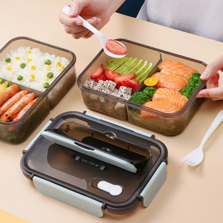 "Bento-låda i plast med flera fack, stilren design i blå, rosa, beige. Perfekt för lunch med BPA-fri, säker för mat."