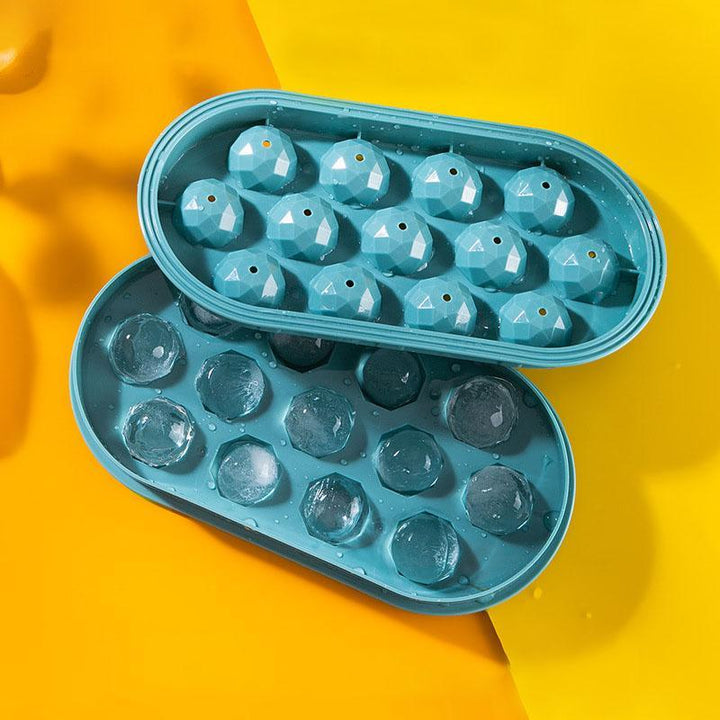 "Blå sfärisk iskubsform i plast för perfekta isbollar, kylning av drycker och efterrätter."