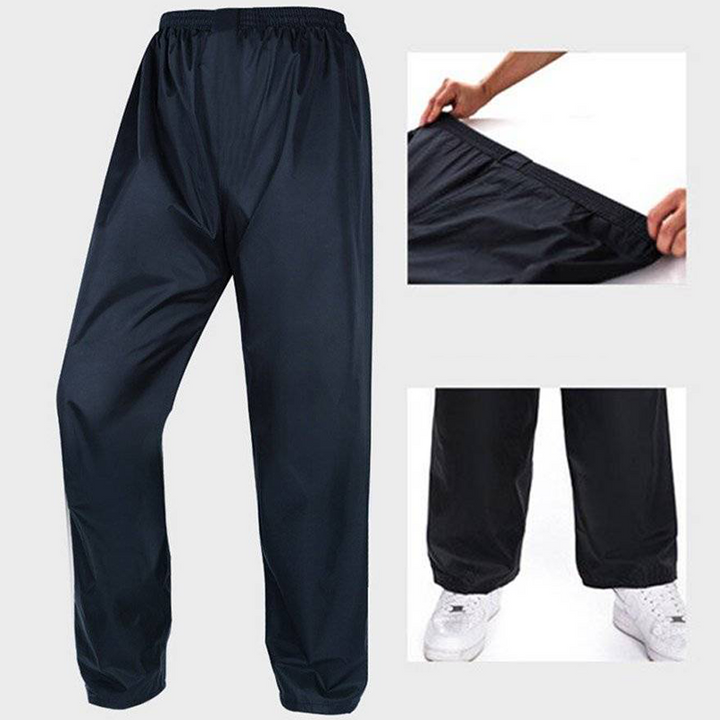 "Blå vindtät unisex regnjacka med reflexband, stilren design för säkert och torrt utomhusbruk."