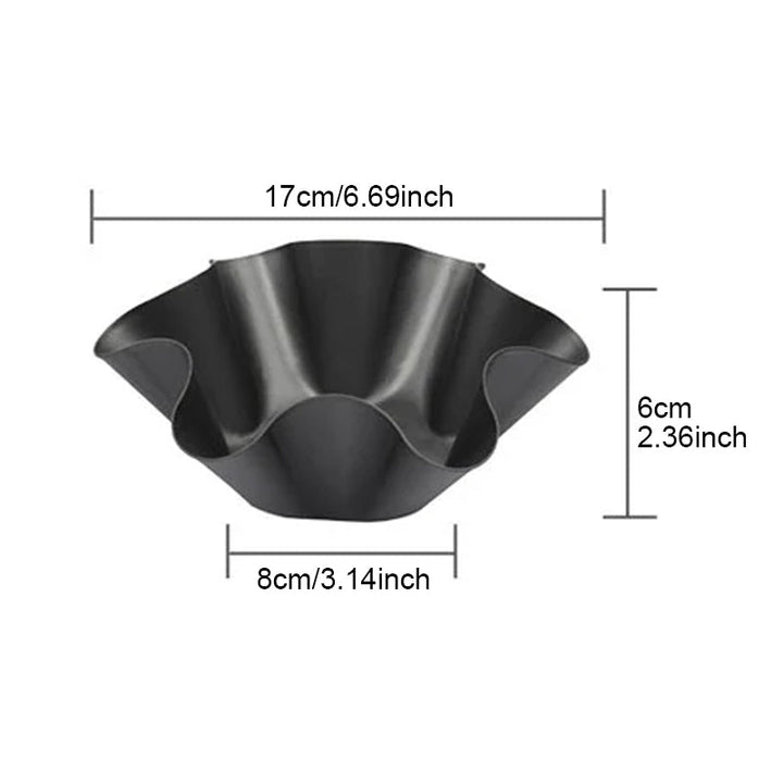 Blombladsformad tortillaskål i kolstål med blommönster, perfekt för kreativa maträtter, robust och non-stick.
