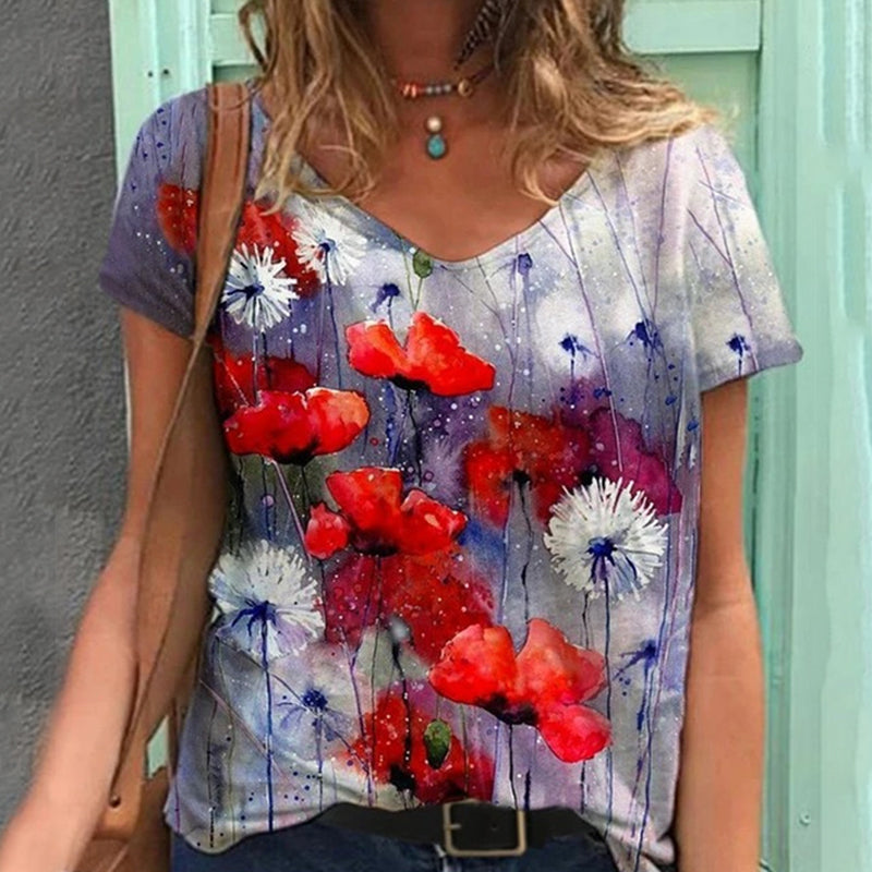"Blommig V-ringad dam t-shirt i mjuk bomullsblandning med blomsterprint, kortärmad och modern design för vardagsbruk."