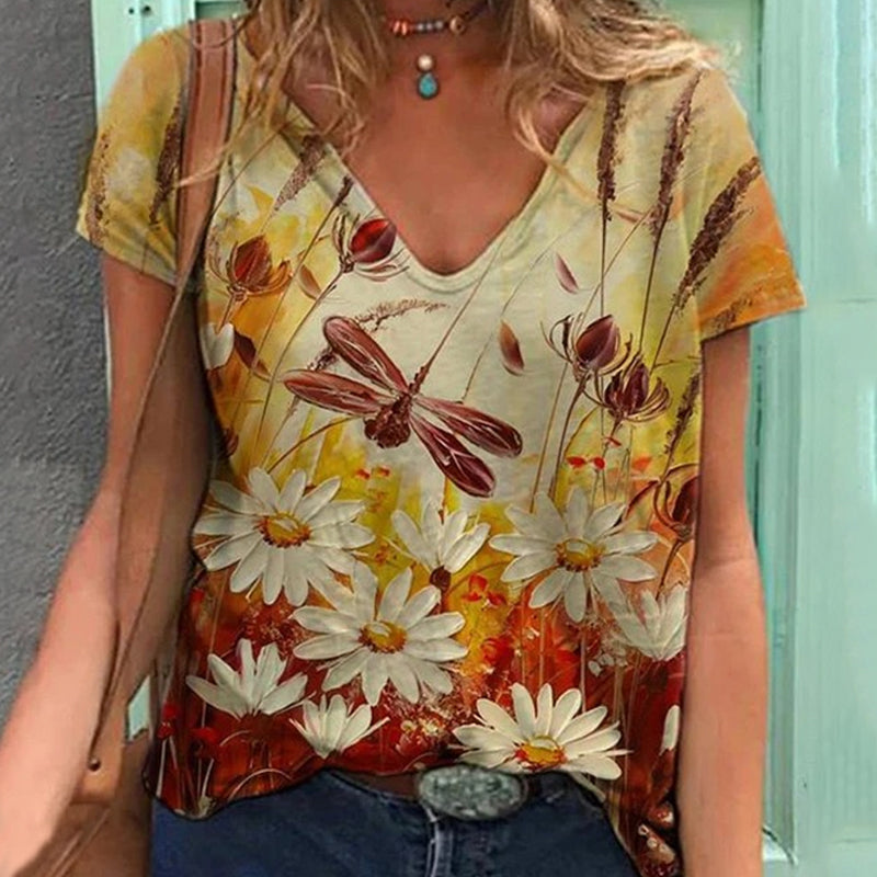 "Blommig V-ringad dam t-shirt i mjuk bomullsblandning med blomsterprint, kortärmad och modern design för vardagsbruk."