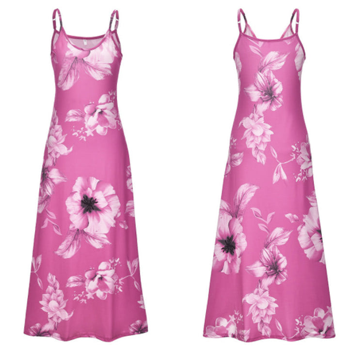 "Boho maxiklänning med färgglatt blommigt tryck, V-ringad, ärmlös, perfekt för sommar. Ger en elegant och avslappnad stil."