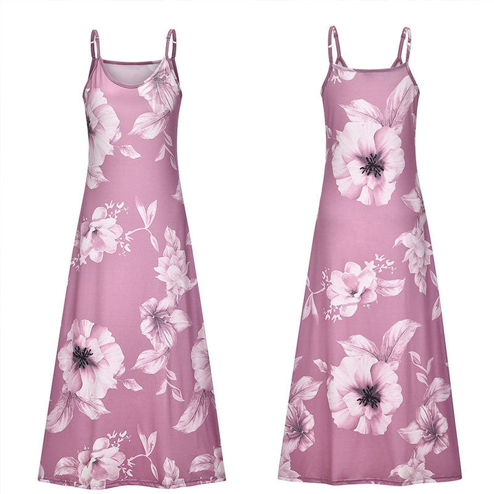"Boho maxiklänning med färgglatt blommigt tryck, V-ringad, ärmlös, perfekt för sommar. Ger en elegant och avslappnad stil."