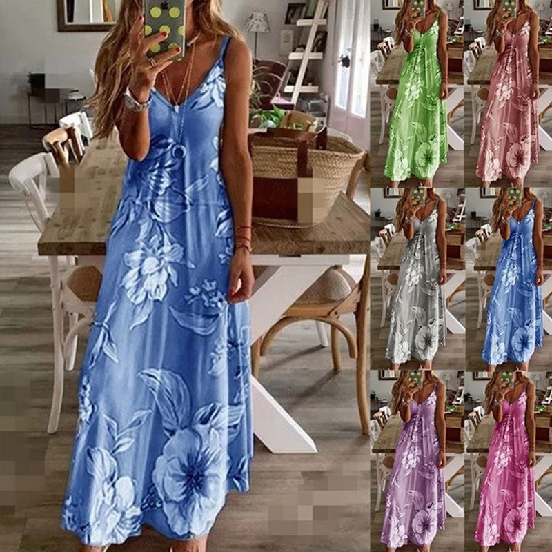 "Boho maxiklänning med färgglatt blommigt tryck, V-ringad, ärmlös, perfekt för sommar. Ger en elegant och avslappnad stil."