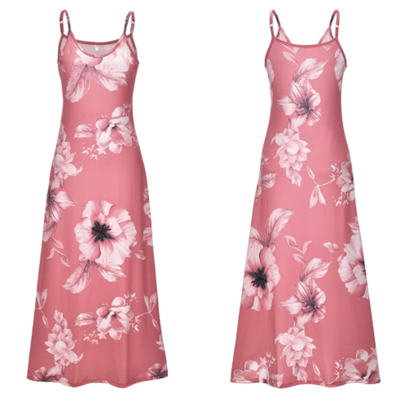 "Boho maxiklänning med färgglatt blommigt tryck, V-ringad, ärmlös, perfekt för sommar. Ger en elegant och avslappnad stil."