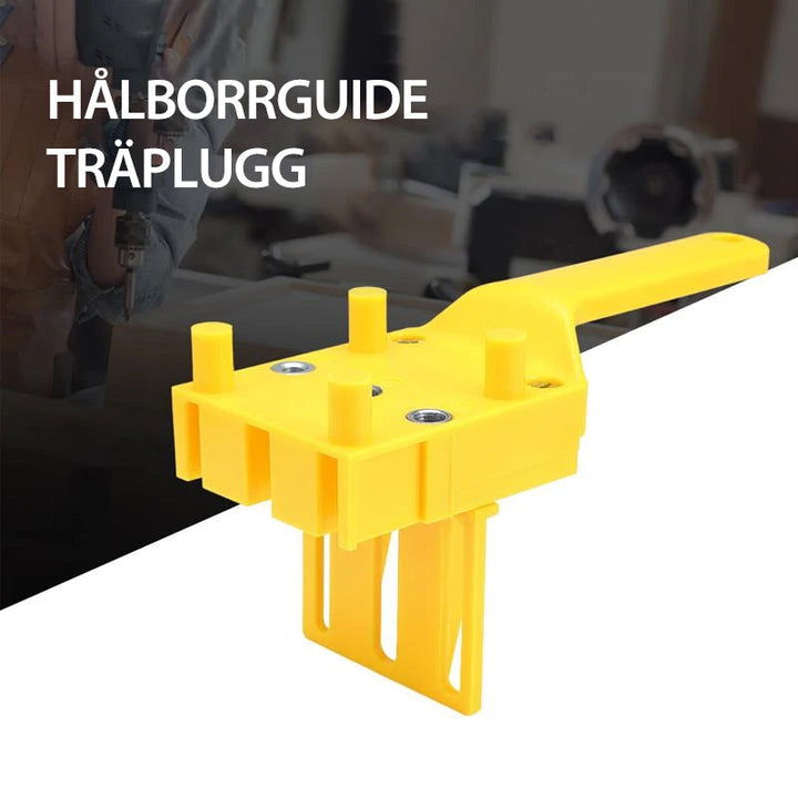 "Borrjigg för hantverkare, justerbar och precis, i slitstarkt plast och metall för snabb och exakt borrning."