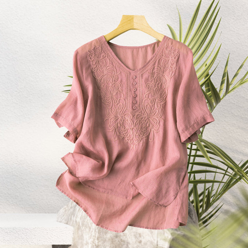 "Broderad dam-t-shirt med kort ärm i bomull och V-hals, elegant broderi, perfekt för sommarens stilfulla dagar"