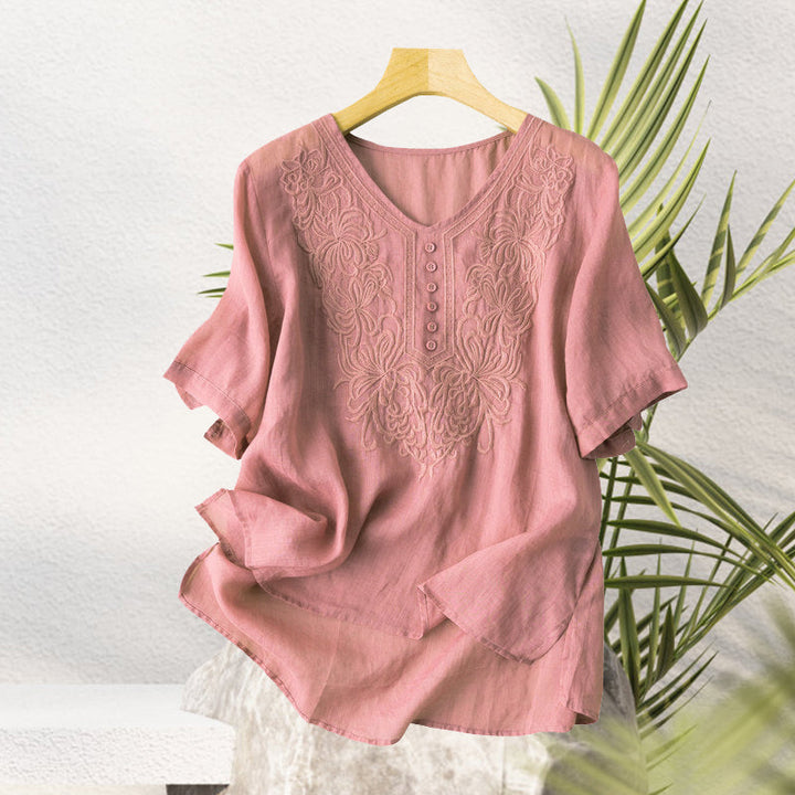 "Broderad dam-t-shirt med kort ärm i bomull och V-hals, elegant broderi, perfekt för sommarens stilfulla dagar"