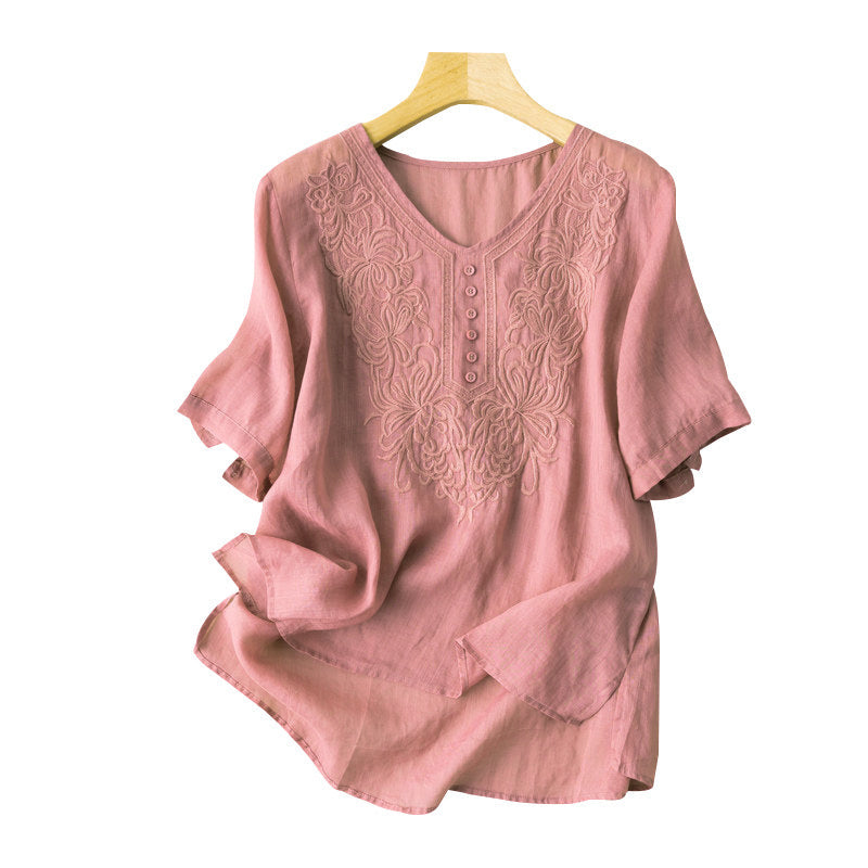 "Broderad dam-t-shirt med kort ärm i bomull och V-hals, elegant broderi, perfekt för sommarens stilfulla dagar"