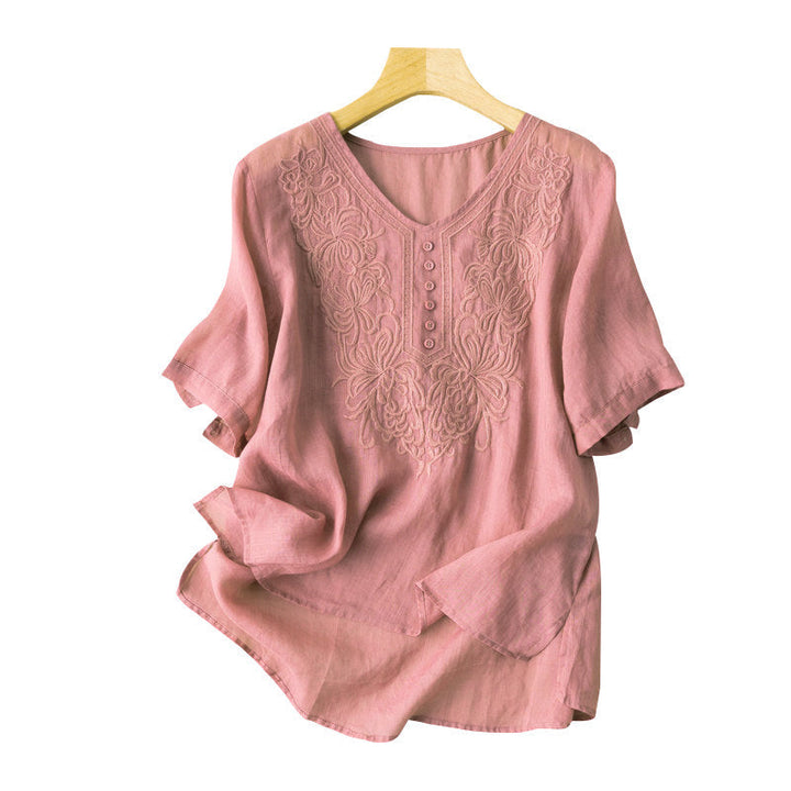 "Broderad dam-t-shirt med kort ärm i bomull och V-hals, elegant broderi, perfekt för sommarens stilfulla dagar"