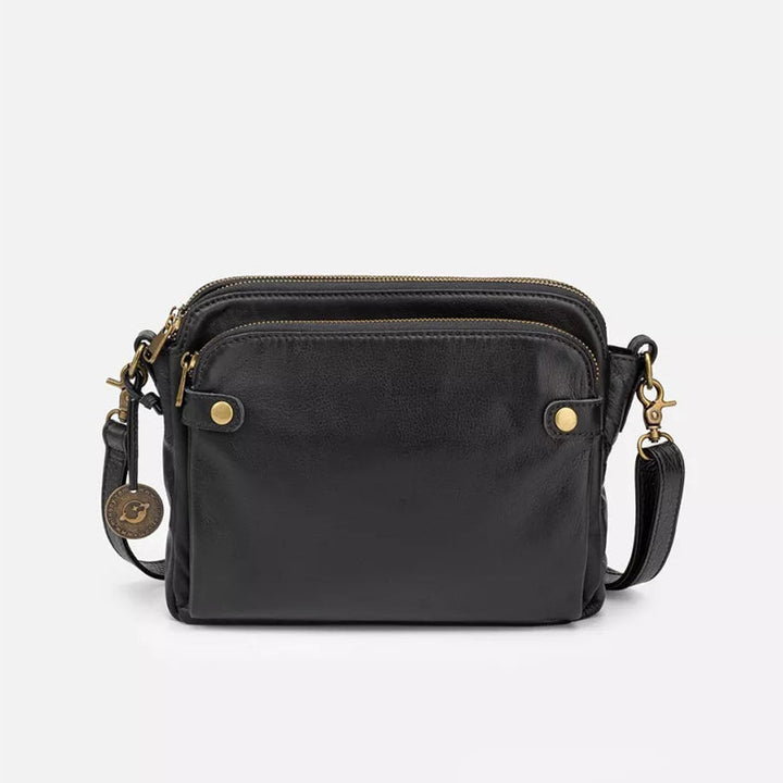 "Brun läder damväska, multifunktionell crossbody, elegant design, rymmer iPad, med RFID-skydd, modern look."