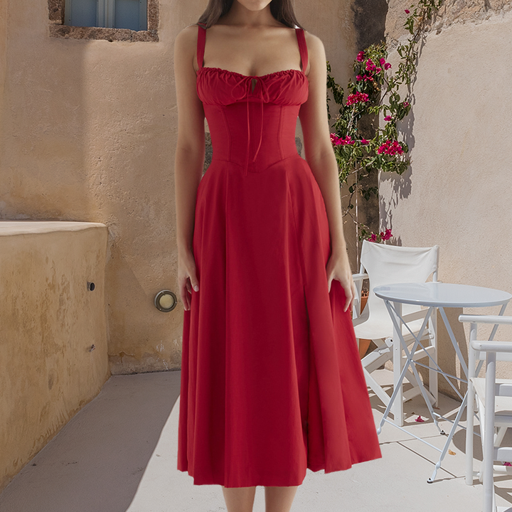 "Carmen Tryckt Bustier solklänning med elegant tryck och bustier liv, perfekt för sommarfester och feminina uttryck."