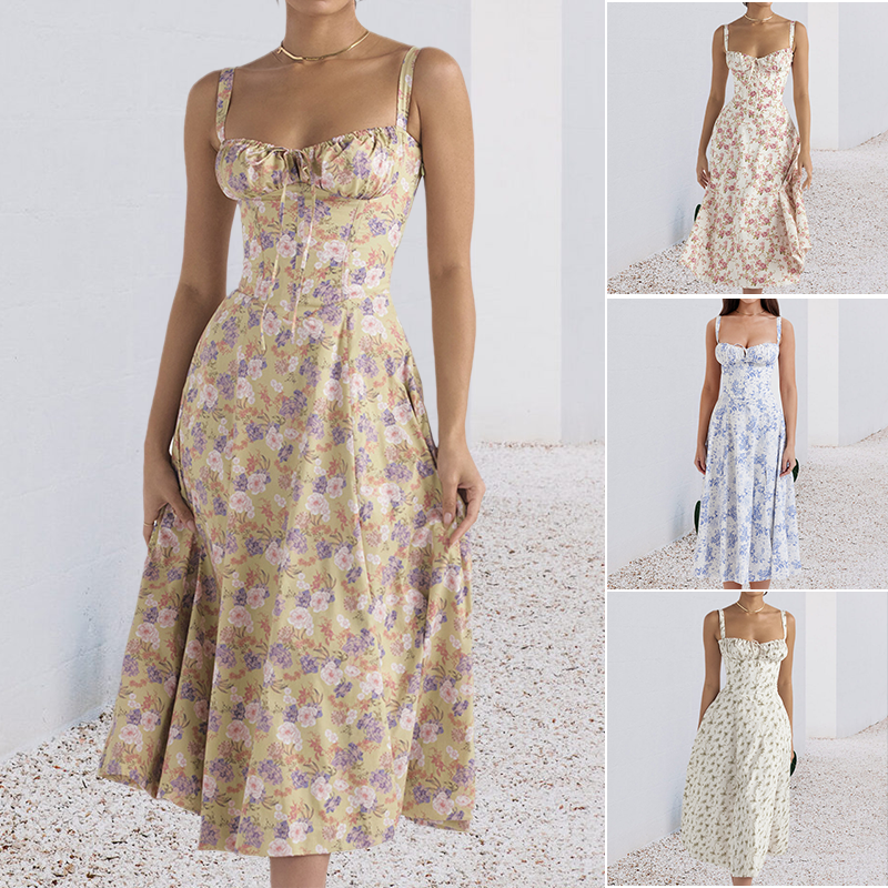 "Carmen Tryckt Bustier solklänning med elegant tryck och bustier liv, perfekt för sommarfester och feminina uttryck."