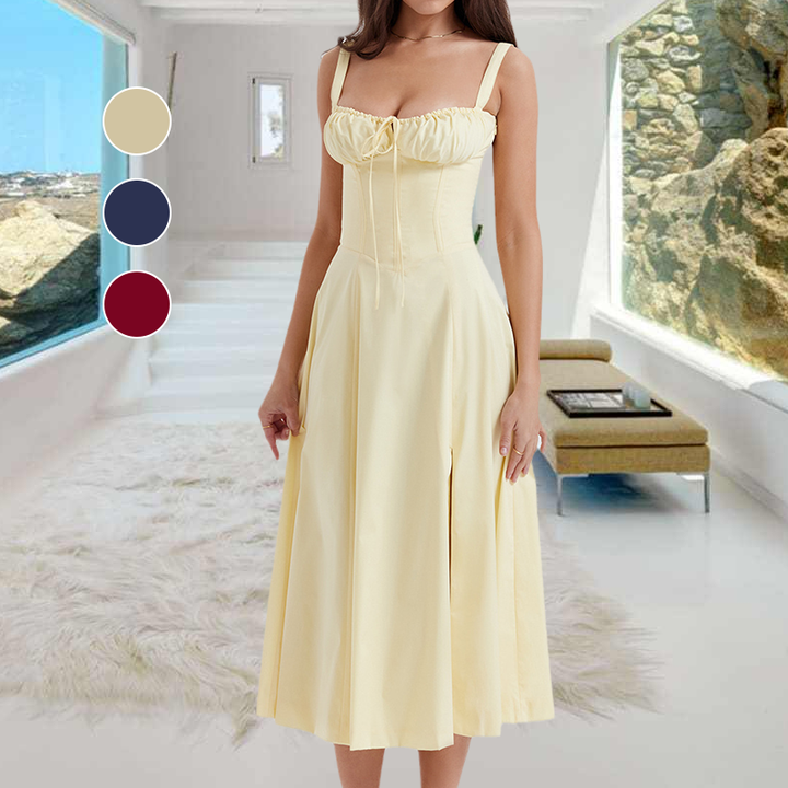 "Carmen Tryckt Bustier solklänning med elegant tryck och bustier liv, perfekt för sommarfester och feminina uttryck."