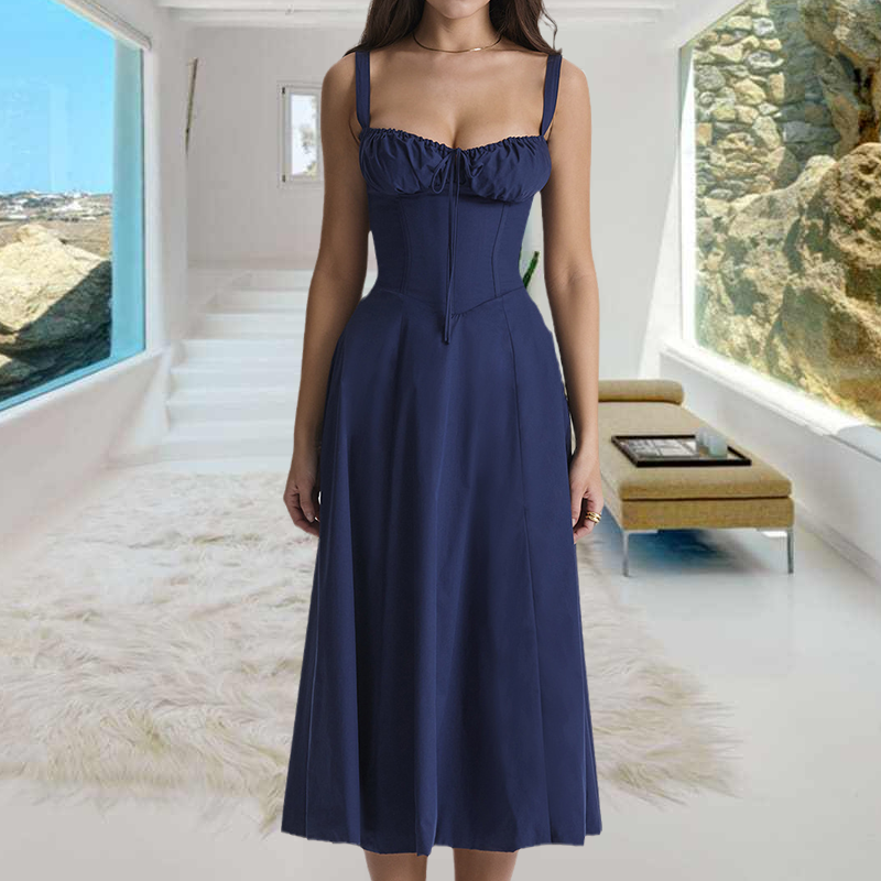 "Carmen Tryckt Bustier solklänning med elegant tryck och bustier liv, perfekt för sommarfester och feminina uttryck."