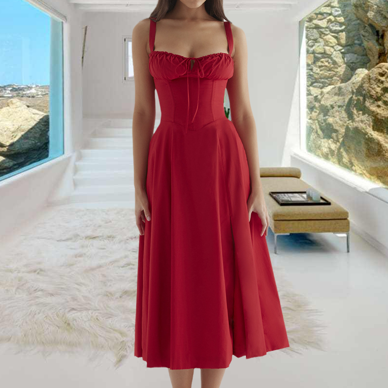 "Carmen Tryckt Bustier solklänning med elegant tryck och bustier liv, perfekt för sommarfester och feminina uttryck."