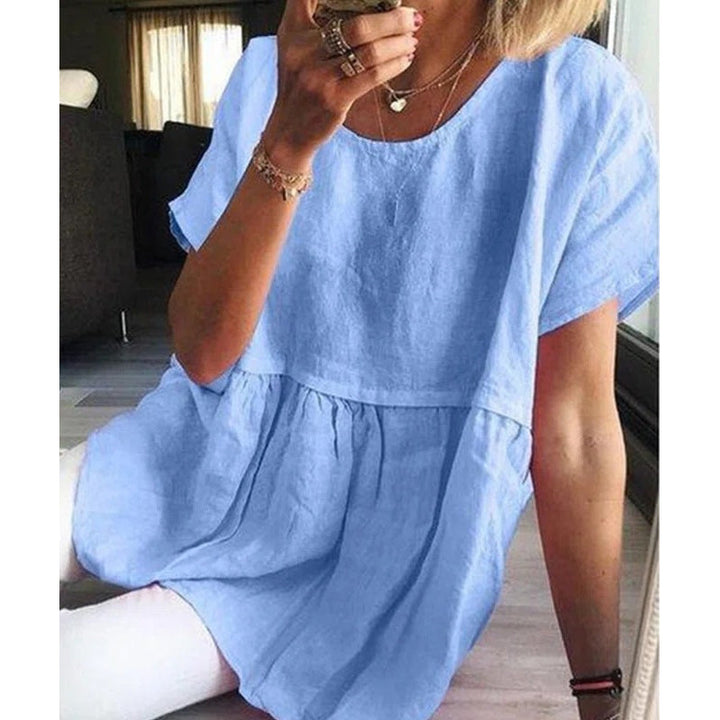 "Casual dam T-shirt i bomull och linne med korta ärmar, tillgänglig i olika färger och storlekar, enfärgad design."
