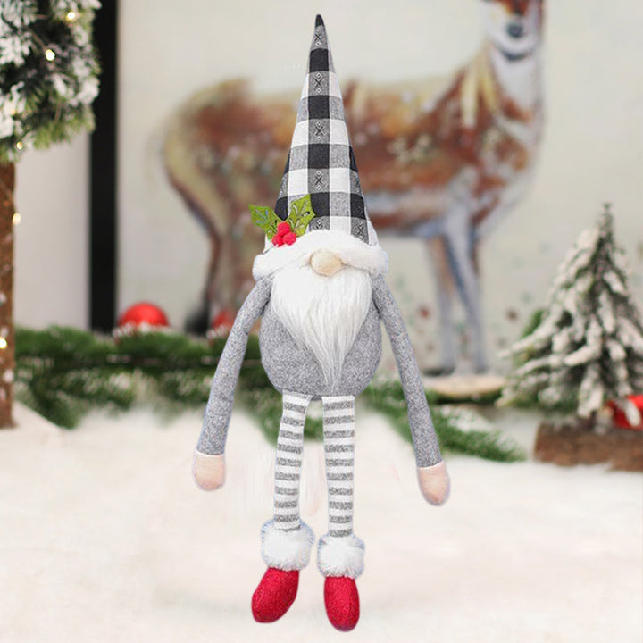 "Charmiga julgardinspännen med tomte- och snögubbemotiv i röd och grå polyester för festlig juldekoration."