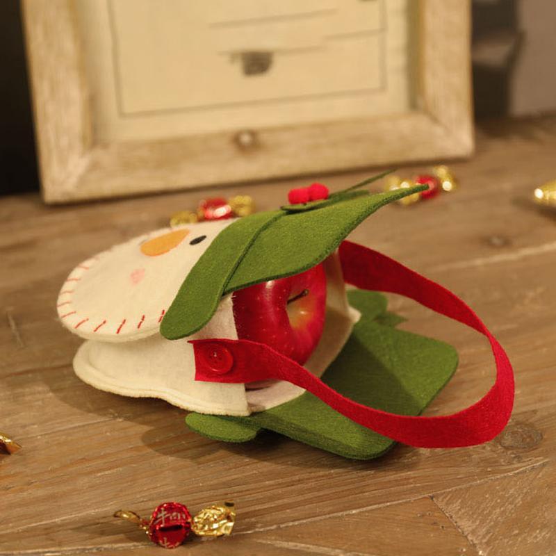 "Charmiga julklappspåsar med 3D-motiv som jultomte och snögubbe i filt, linne och pleuche för julklappsinslagning."