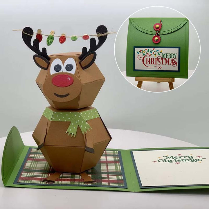 "Charmigt 3D Pop Up julkort med snögubbe och renar, färgglad scen som sprider julglädje."